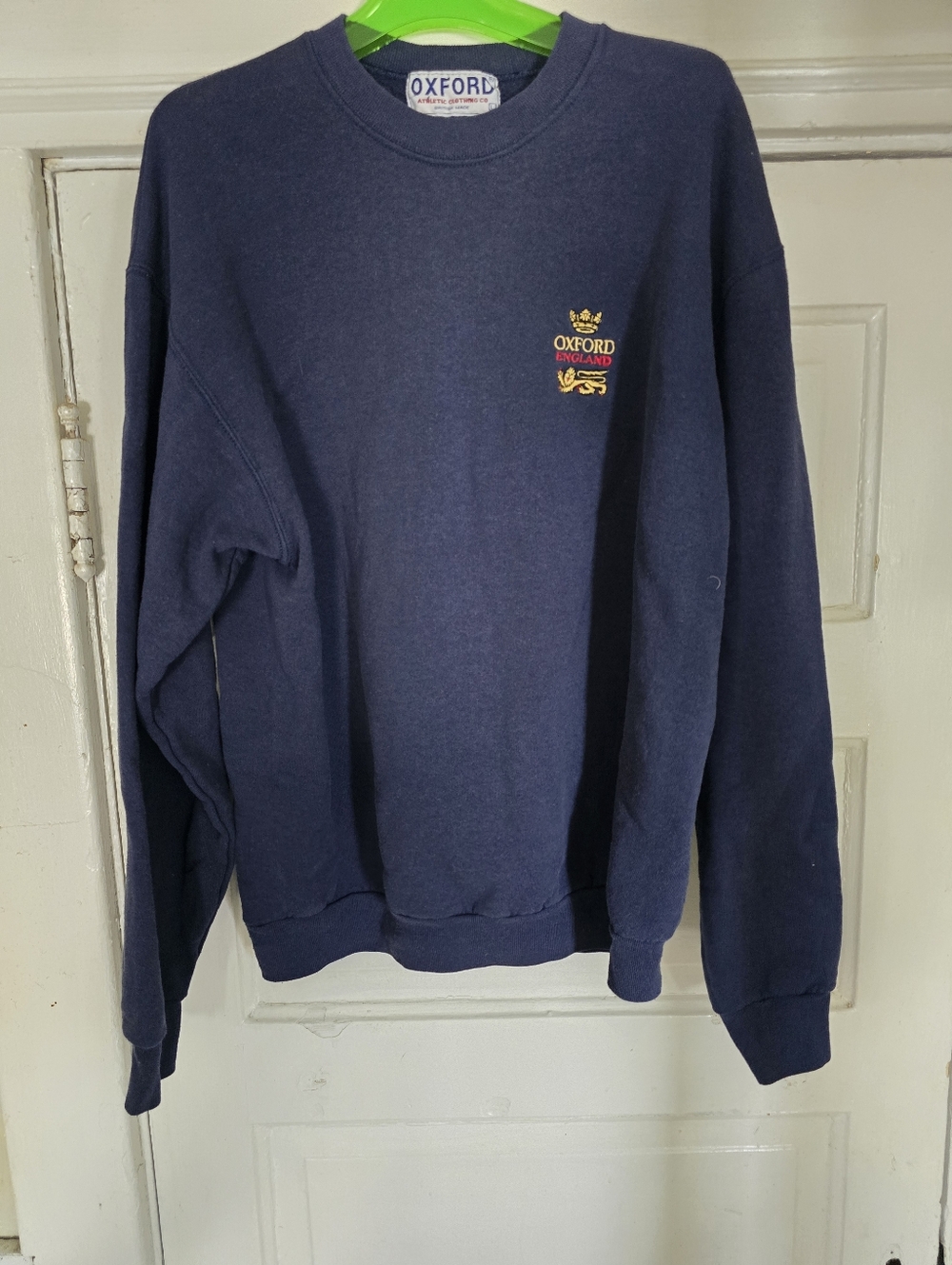 Vintage Oxford Athletic Clothing navy blue crewneck sweatshirt.